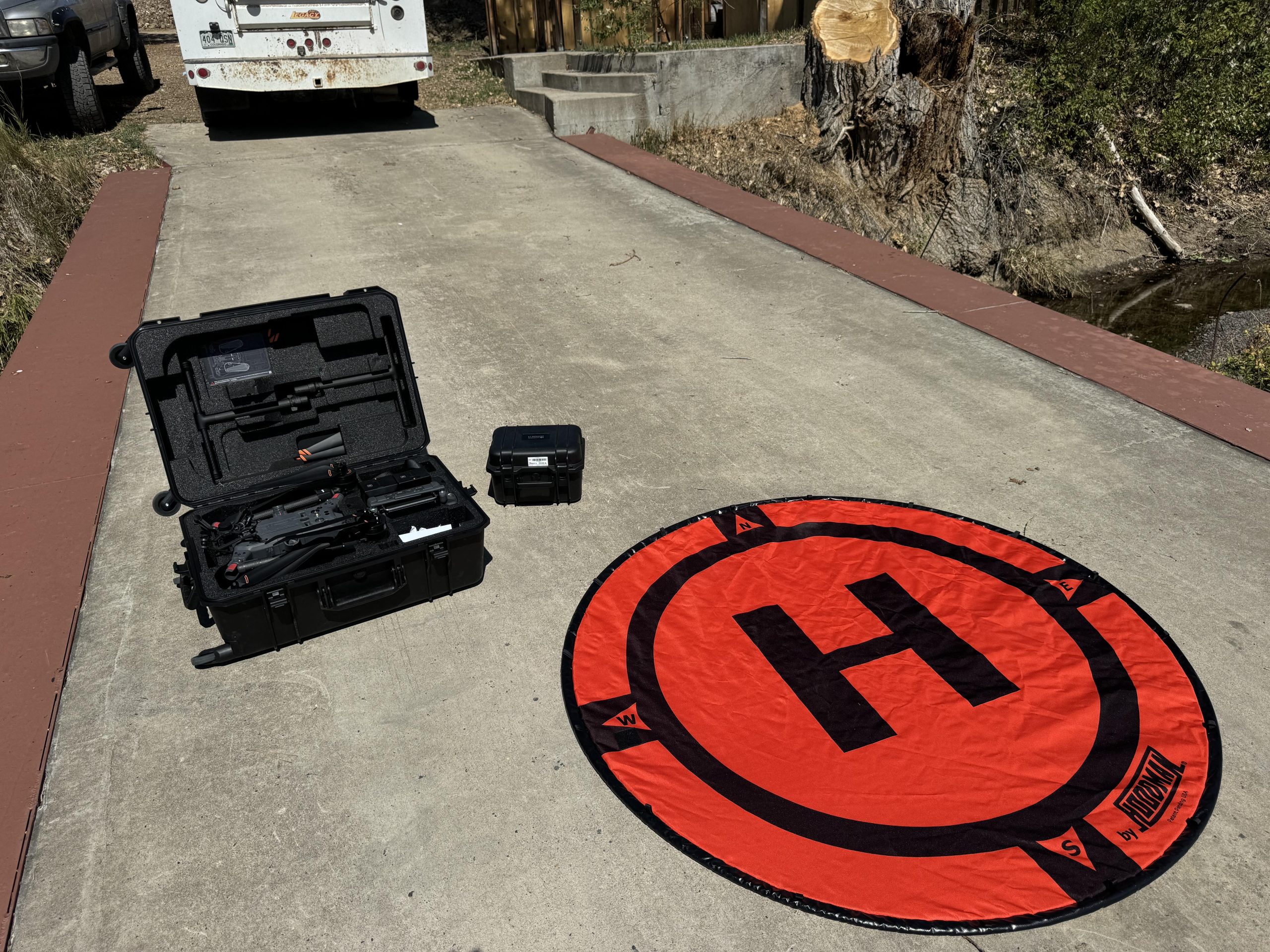 Drone equipment and landing pad at an excavation project Drone equipment and landing pad at an excavation project